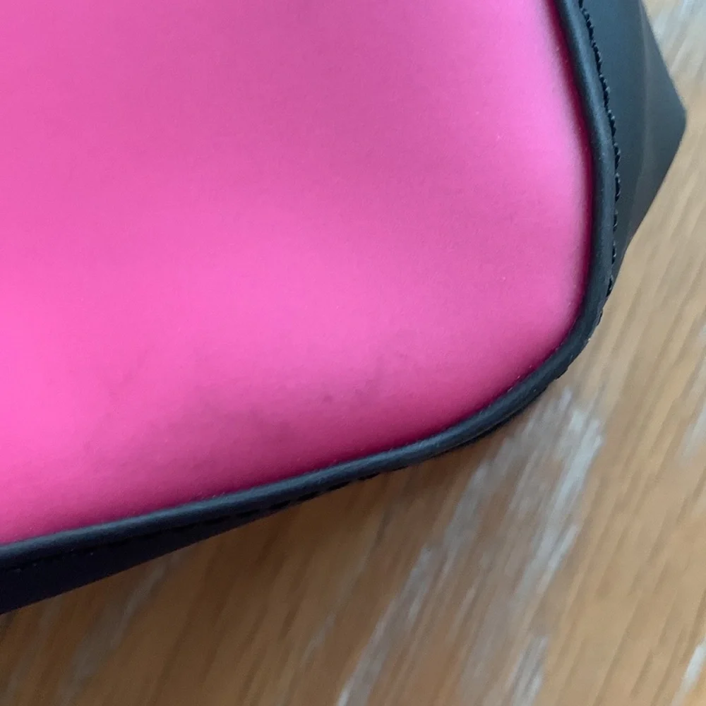 BCBGeneration plastic zippered cosmetic case pink black